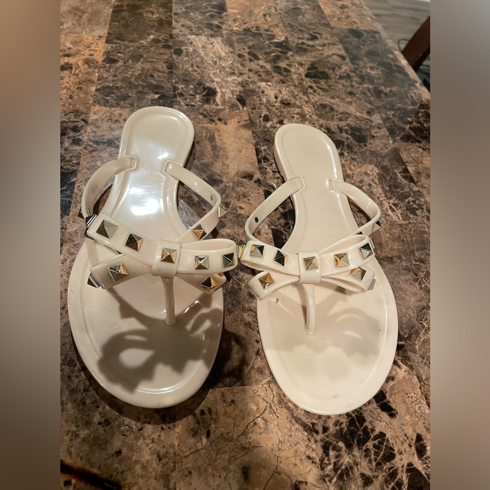 Tan and gold sandals